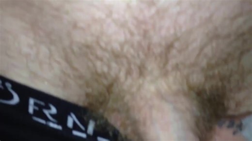 two guys compare the amount of hair...or whatever