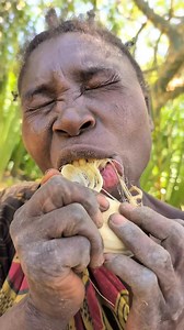 Hadzabe Tribe beautiful bush women show us their favorite traditional snack in their natural bush diet in the nature, these are edible bush plant roots called tubers | Beautiful Adventures