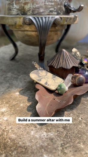 Step into the realm of magic this summer with a stunning outdoor altar! 🌿✨ Let’s create an enchanted space where nature spirits and fairies can thrive. Follow these steps to build your own: 1️⃣ Choose the perfect location: Look for a majestic stump, large stone, or log in your garden as the foundation of your altar. It will serve as a focal point for your magical haven. 2️⃣ Clear the space: Prepare the area by removing any debris, leaves, or clutter. Clearing the energy ensures a fresh start fo