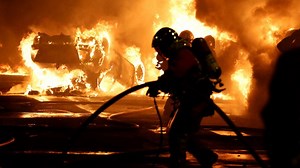 Violent protests spread over teen killing