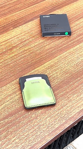 Experience the ease of the HITCH Pull Up Cardholder. Designed for those who appreciate minimalism and efficiency, this tiny yet mighty cardholder in Green and Black colors offers quick access to 8 cards, plus two exterior pockets for your convenience.🤩 Order now: www.hitch-eg.com/products/pull-up-cardholder-natural-genuine-leather-black-green #wallets #rfidwallets #leatherwallets | HITCH