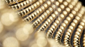 Moving Wireframe Grid with Golden Spheres