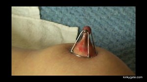 Nipple clamps and glowing wax