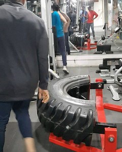 One hand tyre flip | The GYM Nation