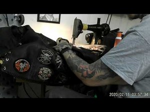 Sewing a patch on a Leather Vest