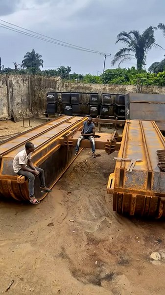 Fabrication of swamp buggy pontoon and installation of excavator into the pontoon