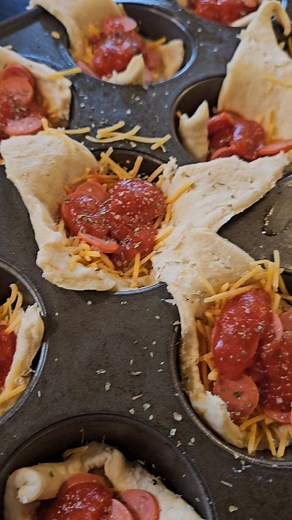 🍕Pizza Puffs🍕 Makes 16 puffs Ingredients: - 2 (8 pack) crescent rolls (or homemade) - 1/2-3/4 cup shredded cheese ( I usually use a mix of sharp cheddar and mozzarella, just used cheddar today) - about 3/4 cup mini pepperoni, or 3/4 cup chopped regular pepperoni -1/2 cup marinara sauce - garlic salt & Italian seasoning to taste *Feel free to add whatever pizza toppings you like! Directions: 1. The easiest way is to mix the "pizza toppings" together in a bowl first. (I didn't make it this way i