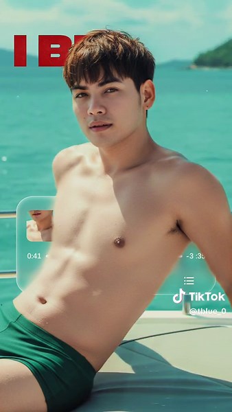 #CapCut Prompt: “Hyper-realistic portrait of me lounging on a yacht at the beach, topless and wearing a dark green short. My hair is short forward fringe and messy top. He is leaning slightly back against the edge of the boat, gazing at the camera with a relaxed, alluring expression. Background: turquoise ocean water with gentle ripples, distant green hills, and a partly cloudy blue sky. Lighting is bright natural sunlight, casting soft highlights and reflections on the water. Apply cinematic so