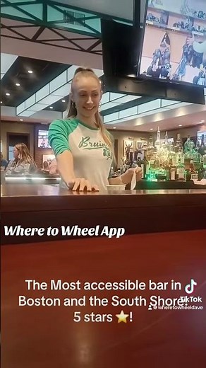 Beautiful girl shows how wheelchair accessible bar works!♿️#accessibility #disability #disabled #sci