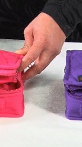 This petite organiser has 6 zippered compartments with see-through...