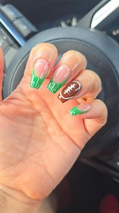 Do you like getting your nails 💅 done? I'm ready for some football 🏈 after getting this hand-painted design. #nailart #naildesign #nailsnailsnails #football #nflfootball | Dawn White