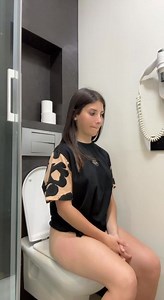 Very beautiful girl clogs hotel toilet