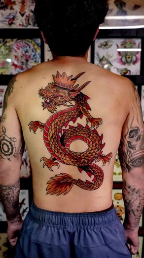 Golden Dragon for Xavier made @SacredHandTattoo This one was earned not only for sitting tough through 2 sessions. He earned through his time in the Navy. A sailor enters the dragon's empire when they cross the International Date Line by sailing west, where Asian nations celebrate the power of the dragon. • • • • #tattootiktok #fyp #columbusohio #goldendragon #navytattoo