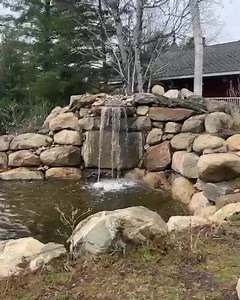 The waterfall fountain is on for the summer! | Couples Resort