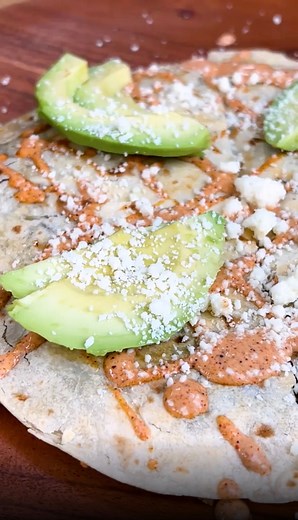 We sure know how to fire things up in the kitchen🔥. Try this vegetarian quesadilla with a spicy crema made using Cholula for your meatless Mondays. | Tasty