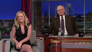David Letterman Plants A Big Kiss On Amy Poehler