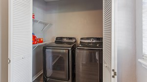 Get A Laundry Room Glow-Up With A Hidden Ironing Board Mirror - House Digest