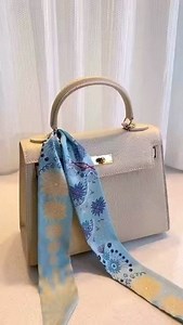 14 reactions | How to tie a slick Scarf to a handbag. #fashionpheeva #womensfashion #fashionblogger #stylingtips #explorepage✨ #explore #reelvideo #fashionhack #shirtstyle #reels #exploreeveeything #reelvideo #handbag #baglover #scaffolding #scarfs #slikscarf #scarfhacks | FashionPheeva Magazine | Facebook