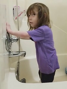 Charley went exploring and found the shower. I always got a kick out of her ending up in really dark places of the apartment. She didn’t have any light perception so it didn’t matter to her. | Smiles for Baby Charley