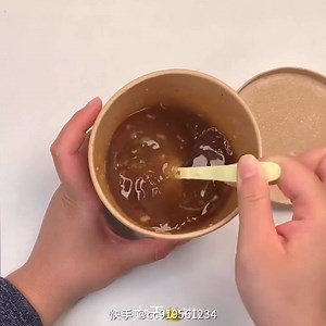 Mixing and stirring clear soft slime with leftover noodle soup