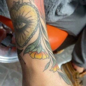 18 reactions | Pretty floral wrist wrap by @kellytorrestattoos | Black Cherry Tattoo Studios | Facebook