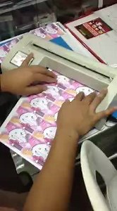 calling card cutter on hand | Uniprint - A Printing Business for Everyone