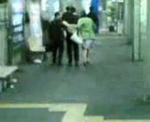 Drunk chick being guided by friends