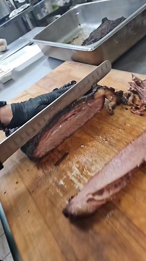Brisket sliced to order Jolly Rogers Woodfired BBQ | Jolly Rogers Woodfired BBQ