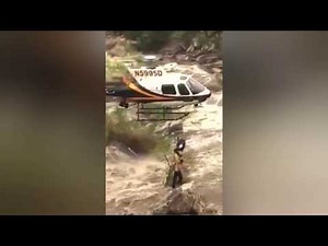 Hiker dangles from chopper during terrifying rescue
