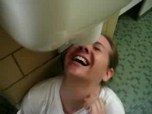 face under hand dryer