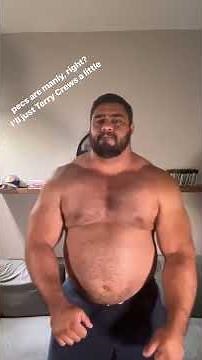 Thick and beefy shirtless muscle bear dancing for our entertainment