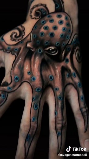 Stunning Octopus Hand Tattoo Designs