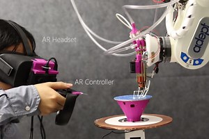 Robotic 3D printer uses augmented reality to fabricate designs as they’re created