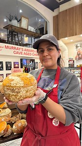 4K views · 48 reactions | The first thing you notice about Mimolette is its striking appearance—a cratered, almost cantaloupe-like rind and deep orange interior. During the 18-month aging process, the classic French cheese develops its sweet, caramelly notes and crumbly, craggy texture. Recreate this bite by stopping into our NYC shops and grabbing the ingredients off our spooky season display, or order them at the link in our bio. | Murray's Cheese | Facebook