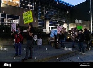 Seattle, USA. 23th Feb 2024 Protestors gather outside the Seattle Police West Precinct at the at the Justice For Jaahnavi Kandula Protest. Protestors have been calling for accountability following the news release that the officer that struck the 23yr old Indian student will not face charges. Jaahnavi was struck and killed early last year at a crosswalk by an SPD officer responding to an overdose call. Several months later a body cam video surfaced and appeared to show an SPD officer laughing wh