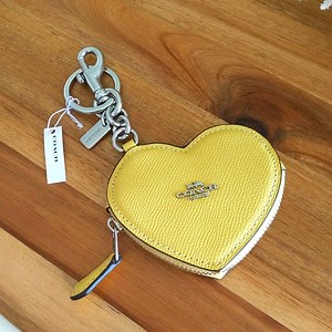 Coach keychain yellow 💛 heart leather silver hardware new with tags authentic!