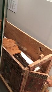 37 reactions | Box-shaped children's coffin with a child mummy on a...