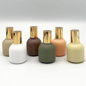 [Hot Item] Wholesale 10ml Morandi Pink Coffee Nude Color Garnet Red White Green Color Essential Oil Roller Glass Bottle with Shiny Gold Lid