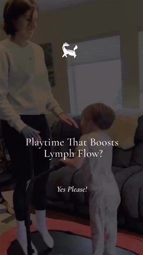 Boosting my lymph flow and burning toddler energy — multitasking at its finest 💛 As a PT, breast cancer survivor, and mama, I’ve learned to squeeze bits of movement into my daily routine wherever possible. ✨ Tag a mom juggling motherhood and lymphedema. We’re in this together. #lymphedema #lymphedemaexercise #rebounding #momswithbreastcancer #breastcancerrehab #lymphedemasupport #breastcancerlymphedema | Pink Badger Cancer Rehab