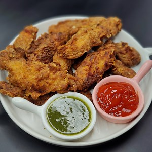 4.4K views · 23 reactions | KFC Style Crispy Chicken Strips Recipe | Corner Cooks | Facebook