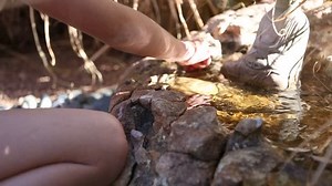 clip-13582178-preteen-girl-playing-water-fountain