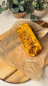 Spicy gochujang bolognese burritos Recipe ⬇️ (serves 4) 500g beef mince, 5% fat 1 red onion, chopped 4 garlic cloves, chopped 1 1/2 tbsp gochujang paste 2 medium carrots, peeled and grated 400ml tomato passata 1 tbsp dark soy sauce 80ml hot vegetable stock made from a stock cube 4 piadina flatbreads 100g grated mozzarella 10 ml olive oil 2 bay leaves 1 tsp thyme salt and pepper to taste Heat 10 ml olive oil in a large frying pan over medium heat. Add 1 red onion and fry for 2–3 minutes until sof