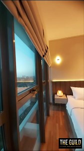 This master bedroom had a grooved bed head panel up to the soffit along with a king bed and a cushioned bed head to add a grand touch to the bedroom setup. Call us to design your bedroom! 🏠 - 573, Nawala Road, Rajagiriya ☎ - 0766 009 111 🌐 - www.theguild.lk ✉ - info@theguild.lk #interiordesign #theguild #srilanka #dreamhome #livingroom #apartmentdesign #bedroom #beddesign | The Guild, Sri Lanka