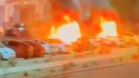 Moment Tesla explodes after suspect using molotov cocktails