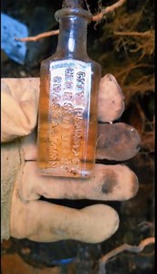 802K views · 6.5K reactions | Often times ground water gets into bottles in privies, making them appear as though they are still filled with their original contents. However, this bottle reeked of alcohol and who knows what else, so the contents were most definitely original! Bottle circa 1905 from Chaska, Minnesota. This is older footage (hence the format). | Coolest Coins | Facebook