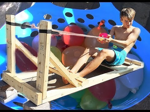 🎈💦 GIANT WATER BALLOON SLINGSHOT 💦🎈 - Swimming Pool Antics! - vlog e225 slingshot