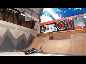 BMX Rider Fails Hard on Indoor Quarter Pipe