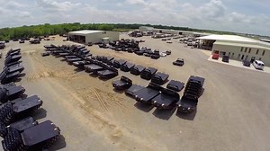 Fly over CM Truck Beds manufacturing facility and see the largest on-hand inventory of truck beds available. | CM Truck Beds