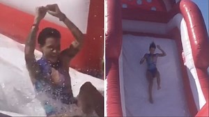 Ruby Rose flips down slide at Taylor Swift's Forth of July bash