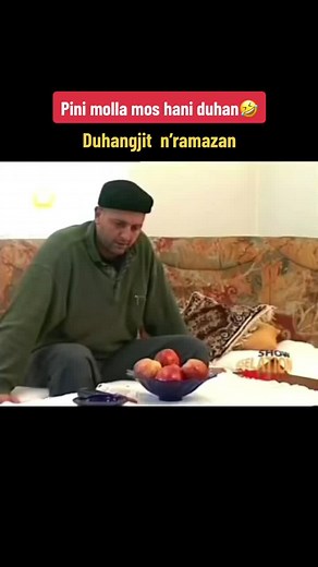 Playful Couch Interaction Between Friends